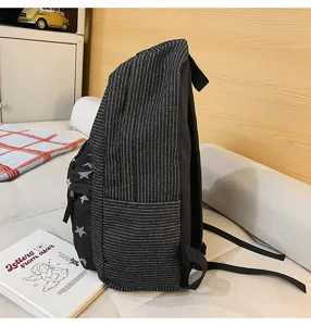 Casual striped denim backpack with star pattern, large capacity school bag for daily use.