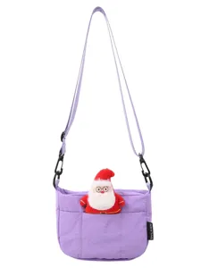 Modische lila Umhängetasche mit süßem Weihnachtsmann-Plüschornament für Damen im Alltag.