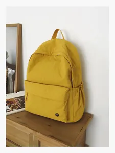 Sac à dos d'école jaune décontracté pour étudiants, sac de voyage élégant et littéraire.