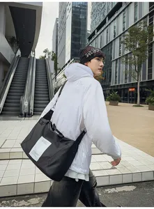 Bolso bandolera negro de moda para hombres y mujeres, bolso elegante para viajes y diario.