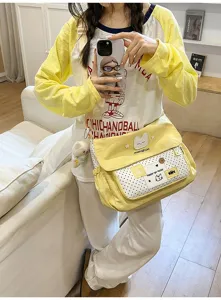 Cute canvas messenger bag for middle school girls, sweet polka dot crossbody shoulder bag.