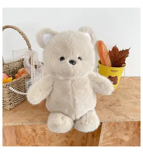 Simpatico orsetto di peluche beige, morbida bambola di peluche per regalo bambini deco.
