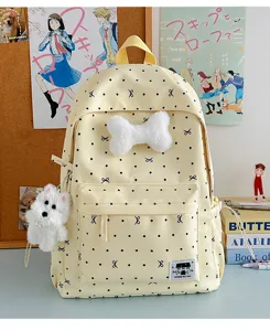 Süßer Cartoon Schüler Rucksack große Kapazität hellgelber Schulranzen mit Plüsch Schleife Anhänger