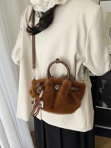 Chic autumn winter plush bucket bag for women, soft faux fur crossbody shoulder handbag.