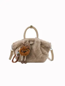 Fuzzy plush pleated bucket bag for women, stylish autumn winter shoulder crossbody bag.