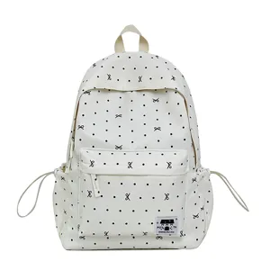 Süßer Pünktchen-Schulrucksack mit Schleifen-Mustern, große Kapazität für Schüler und Alltag.