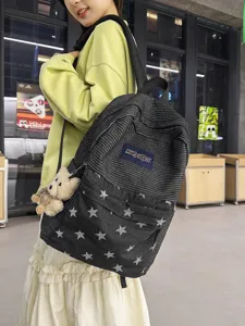 Stylish striped denim student backpack with star pattern and cute bear pendant for daily use.