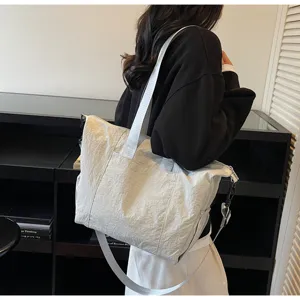 Casual large capacity tote bag for women, stylish shoulder crossbody travel bag daily use.
