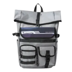 Sac à dos casual gris à enroulement avec plusieurs poches, voyage et école élégants.