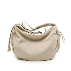 Beigefarbene Cordschultertasche, lässiger Slouchy-Hobo-Stil mit verstellbarem Riemen.