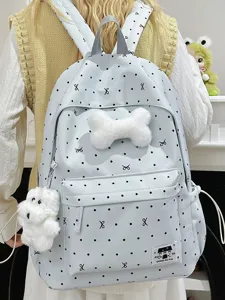 Niedlicher Schülerrucksack mit Pünktchen, Plüschknochen-Dekor und Hundanhänger für den Alltag.