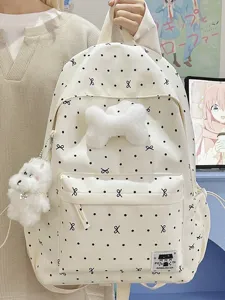 Süßer Canvas Schulrucksack mit schwarzen Punkten Schleifen und Plüsch Hund Anhänger für Schüler.