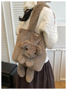 Detailed shot of the cute brown plush puppy tote bag showcasing soft texture and animal design.