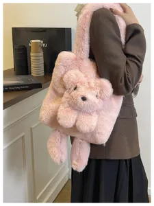 Cute pink plush bear tote bag for women, soft furry shoulder bag with cute cartoon animal design.