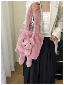 Pink plush tote bag with cute 3D bear design, soft large capacity shoulder handbag for women.
