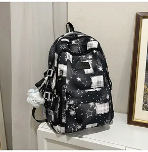 Sac a dos noir avec motif etoiles et carreaux, grande capacite pour femmes et etudiants.