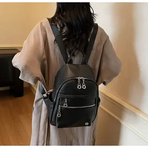 Stylish black PU leather backpack for women, spacious casual daily commuter design.