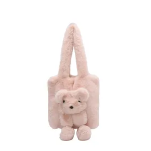 Detailed view of the cute pink plush tote bag with a soft animal plush design feature.
