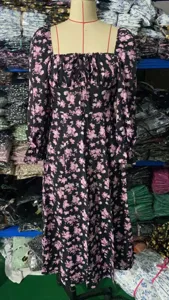 Floral long sleeve midi dress featuring a square neckline and a flattering waistline.