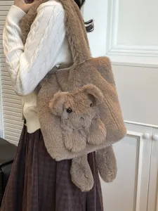 Fluffy plush tote bag for women, cute cartoon animal shoulder bag, large winter handbag style.