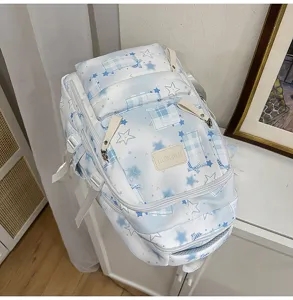 Sac a dos ecole carreaux etoiles bleu clair, sac etudiant decontracte avec poches et details.