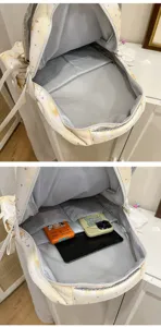 Grand sac à dos d'école avec plusieurs compartiments, parfait pour un usage quotidien.