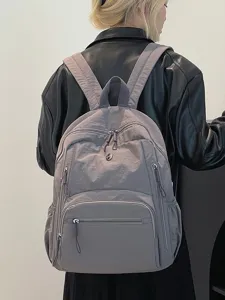 Sac à dos d'école en nylon style coréen simple et polyvalent pour étudiants, résistant à l'eau.