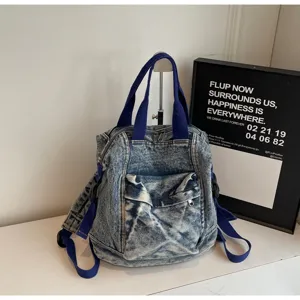 Washed denim women backpack large capacity fashion casual student school bag daily use.