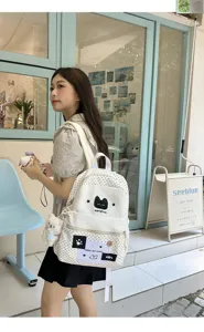 Mochila de lona con lunares de estilo japonés lindo para estudiantes con parche de gato.
