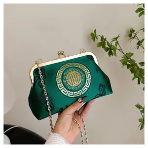 Elegant Chinese style satin evening shoulder bag featuring gold chain strap and clasp.