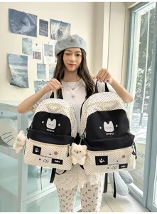 Mochila escolar japonesa linda con bordado de gato y gran capacidad para estudiantes.