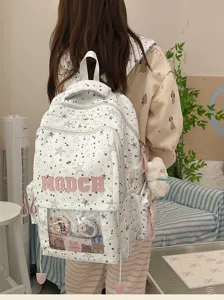 Sac à dos d'étudiant de grande capacité décontracté avec motif d'étoiles et poche avant.