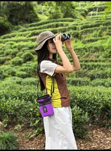 Elegante borsa a tracolla a secchiello viola, borsa alla moda con coulisse per esterni.
