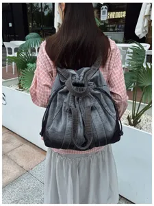 Grand sac à dos en denim lavé vintage, cartable étudiant multifonction et sac de voyage.