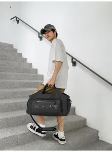 Detailed view of the stylish sports travel duffel bag, showing large capacity and comfortable strap.