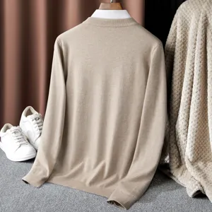 Detail view of a classic solid color V-neck knit sweater, soft casual autumn apparel.