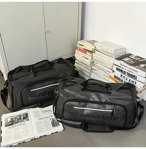Detailed view of large capacity casual travel duffel bag with shoulder strap in scene.