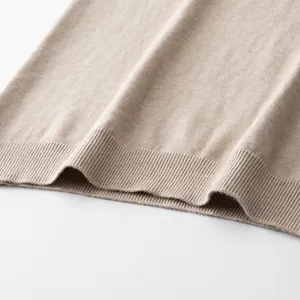 Detailed close-up shot of men women casual knit sweater ribbed hem soft fabric texture
