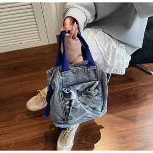 Washed denim women backpack casual large capacity trendy simple student school bag detail.