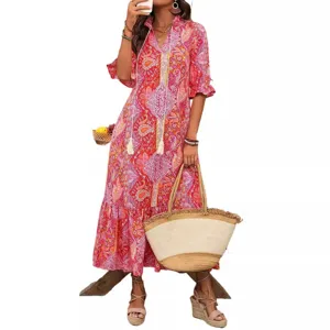 Boho floral print maxi dress with V-neck, tassel ties, and half sleeves for women.
