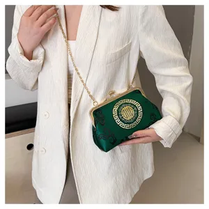 Chic Chinese style satin evening bag with metal clasp and chain strap for women.
