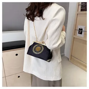 Stylish Chinese style cloud pattern kiss-lock women evening shoulder bag detail.