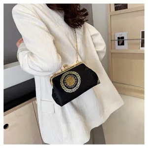 Fashion Chinese style evening bag with metallic clasp and chain strap, elegant shoulder bag detail.