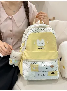 Mochila de lona con lunares estilo japonés lindo con bordado de gato y colgante.