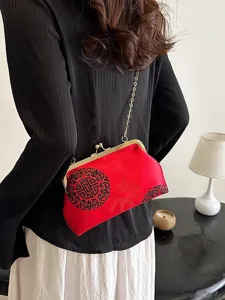 Red Chinese style evening bag with metal kiss lock and chain strap, elegant retro shoulder bag.