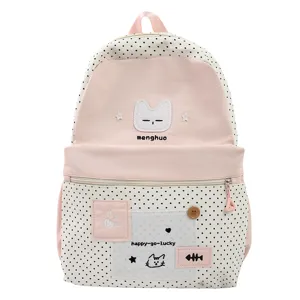 Detalle de bordado de gato lindo y diseño bicolor en la mochila escolar de lona elegante.