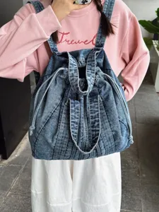 Sac à dos en denim délavé vintage pour femmes hommes, grand sac de voyage et d'école décontracté.