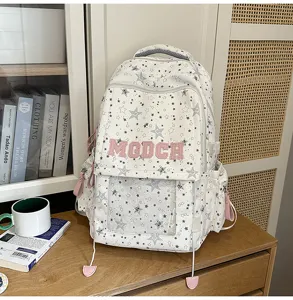 Grand sac à dos d'étudiant avec motif d'étoiles et lettres roses pour l'école.