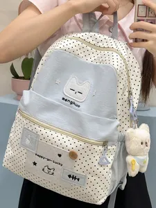 Mochila bonita de lunares para estudiantes con bordado de gato y colgante de peluche.