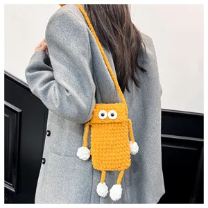 Handcrafted yellow crochet phone bag detail, cute big eyes cross-body bag for women.
